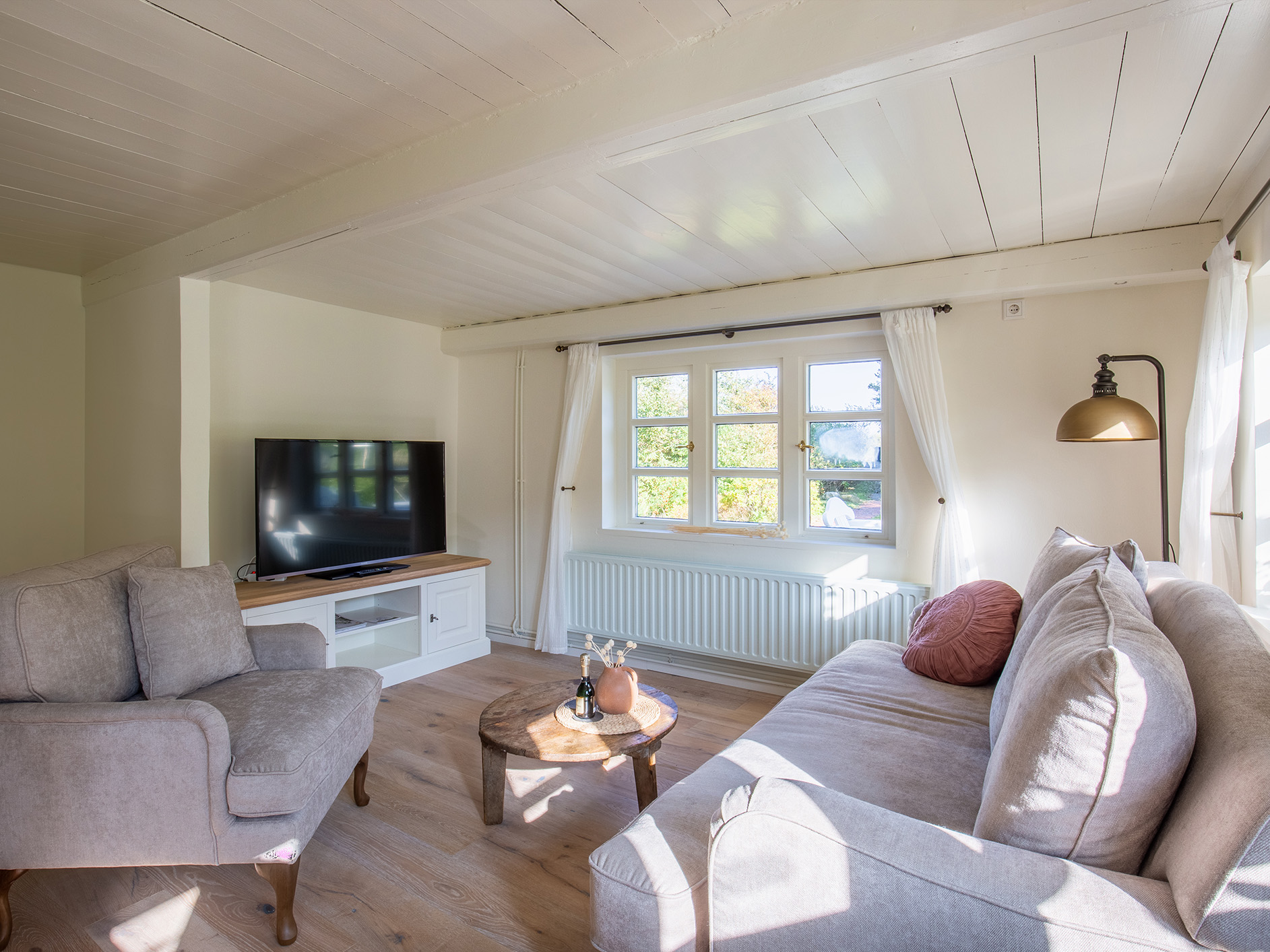 Blick in das Wohnzimmer im Ferienhaus Rungholt